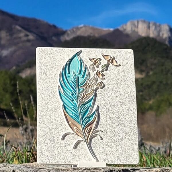 Grand diffuseur d'huile essentielle motif plume couleur turquoise.